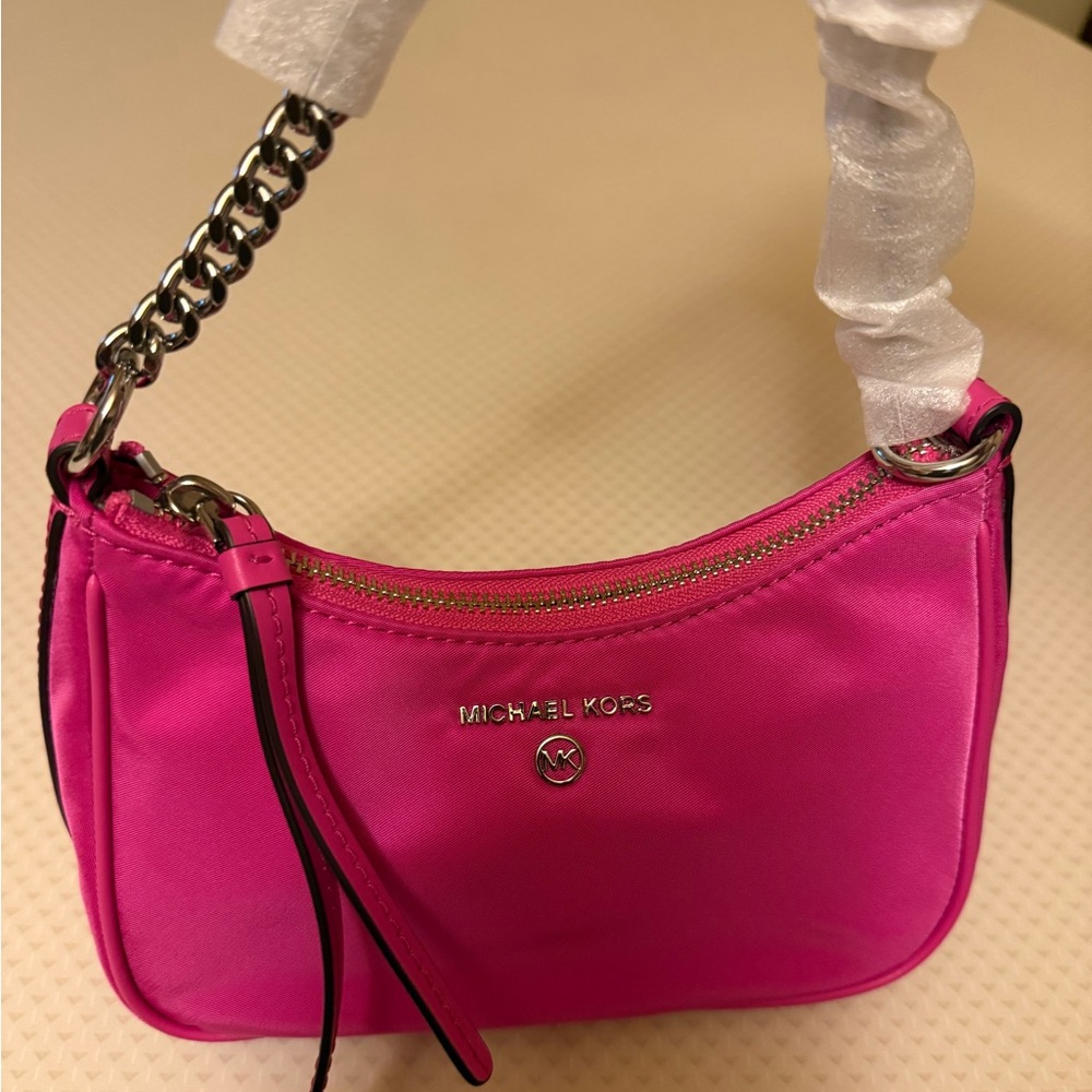 Michael Kors brand new Small Jet Set Nylon Mini Handbag in bright pink.